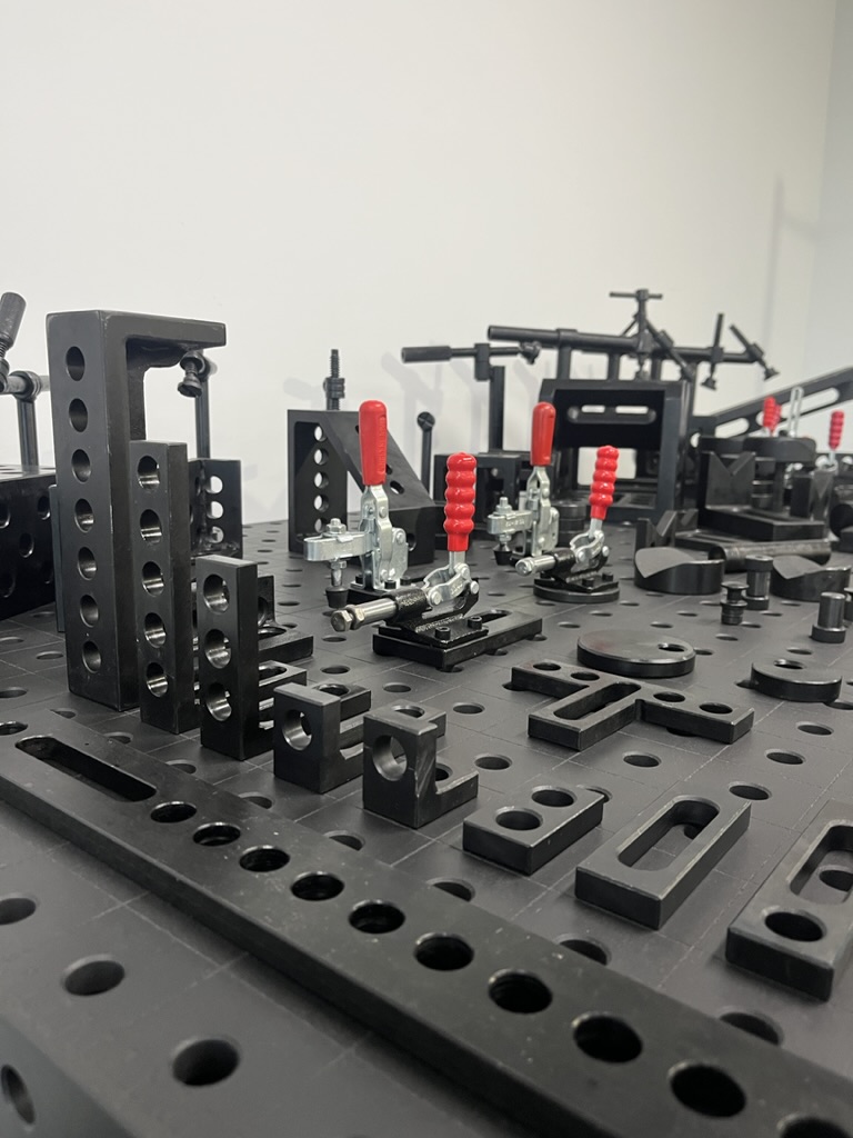 Range of welding table pins, clamps, blocks and stops